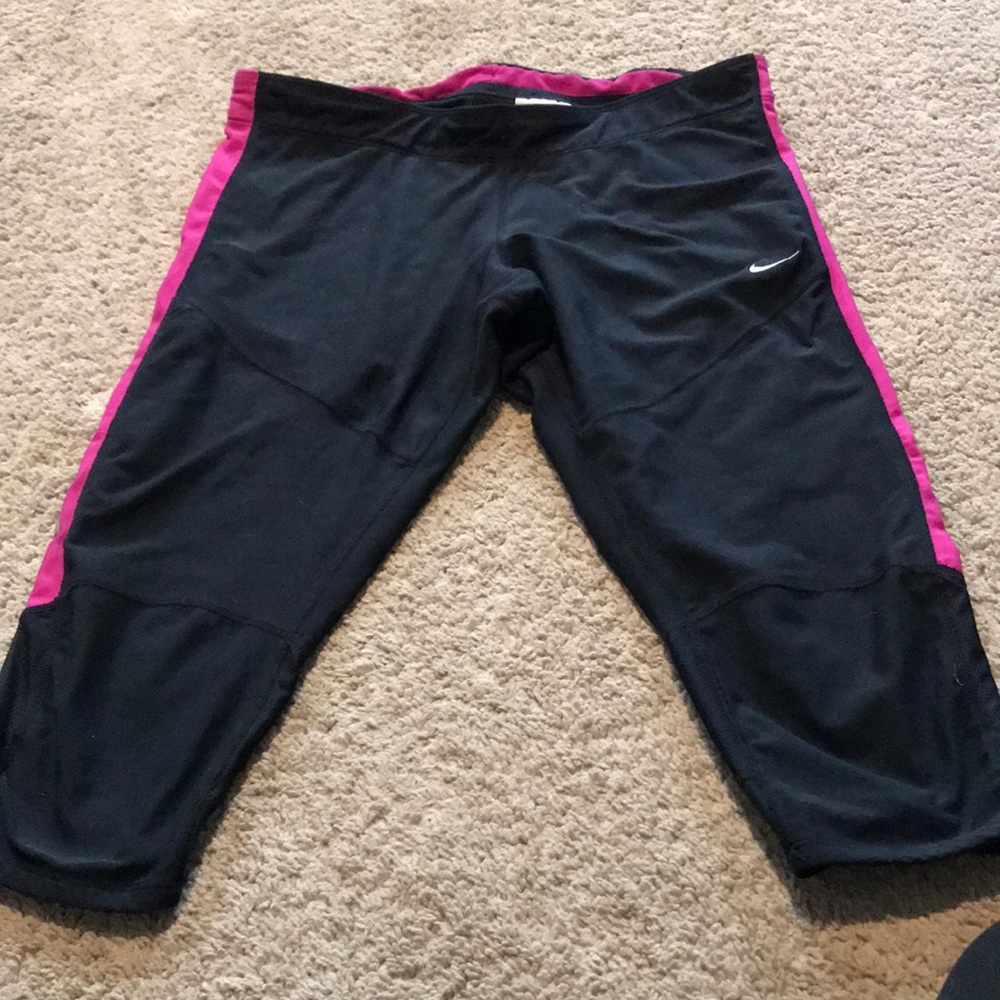 Black and purple Nike running capris